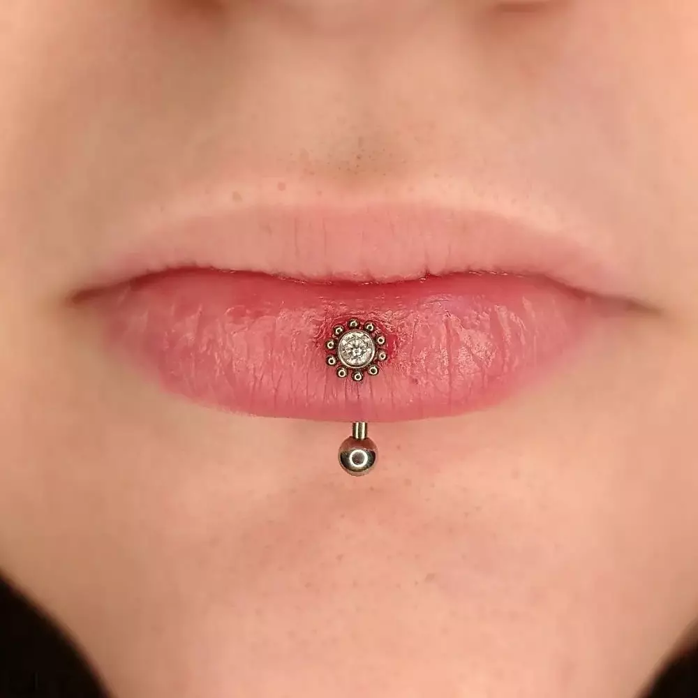 All You Need to Know About Vertical Labret Piercings