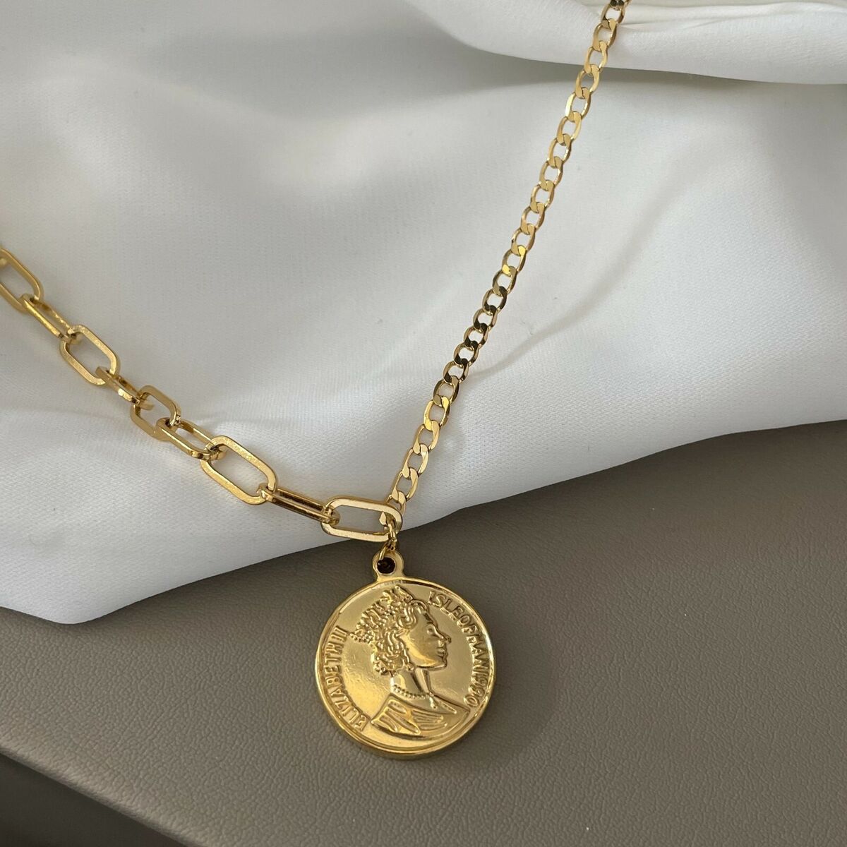 gold coin pendant